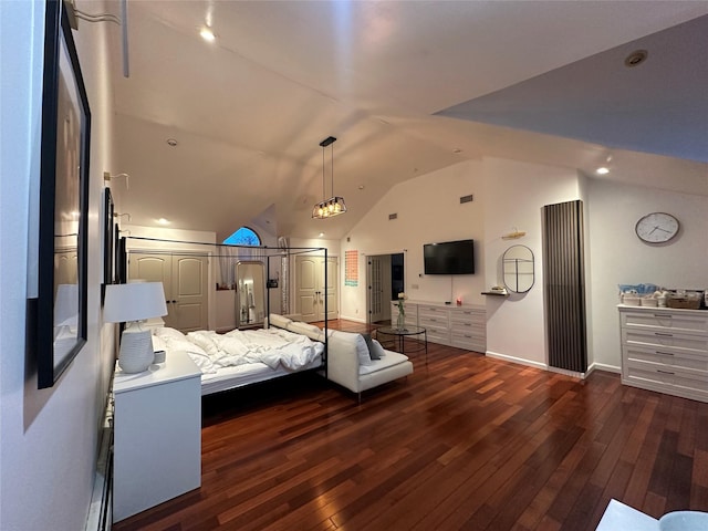 121 W Seaman Ave, Freeport, NY 11520 - bedroom featuring recessed lighting, lofted ceiling, and dark wood finished floors