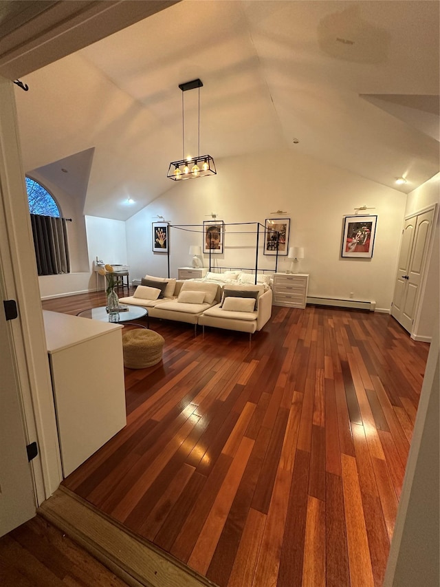 121 W Seaman Ave, Freeport, NY 11520 - living room with dark wood-style flooring, a baseboard radiator, and lofted ceiling