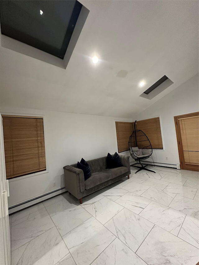 121 W Seaman Ave, Freeport, NY 11520 - interior space with a baseboard radiator, marble finish floor, and lofted ceiling