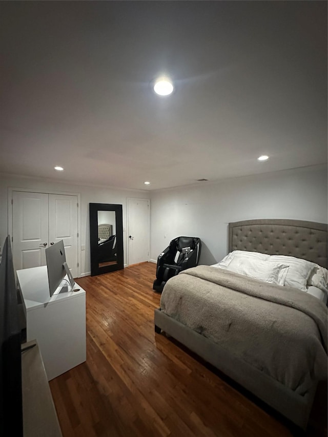 121 W Seaman Ave, Freeport, NY 11520 - bedroom featuring recessed lighting and wood finished floors