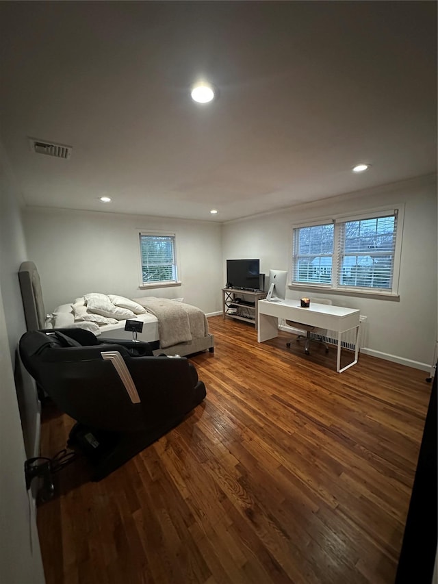 121 W Seaman Ave, Freeport, NY 11520 - bedroom featuring recessed lighting, visible vents, baseboards, and wood finished floors