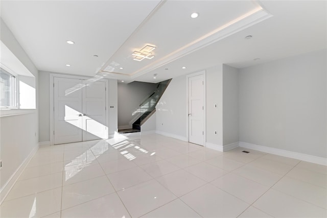 interior space with recessed lighting, stairs, light tile patterned floors, and baseboards