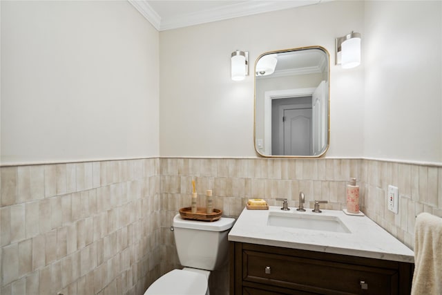 46 Wensley Dr, Great Neck, NY 11021 - bathroom featuring toilet, ornamental molding, tile walls, vanity, and a wainscoted wall