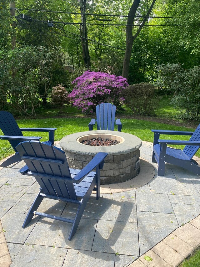 46 Wensley Dr, Great Neck, NY 11021 - view of patio featuring a fire pit