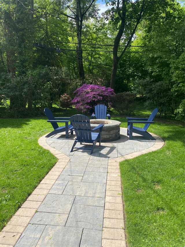 46 Wensley Dr, Great Neck, NY 11021 - view of patio featuring a fire pit