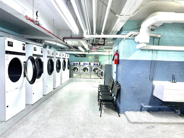 shared laundry room featuring independent washer and dryer