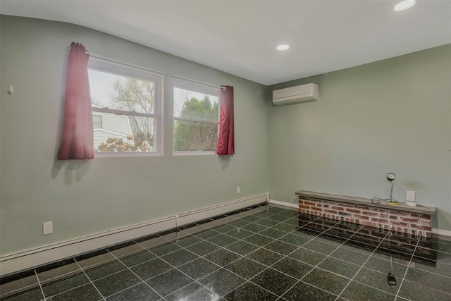 empty room with recessed lighting, a wall mounted AC, a baseboard heating unit, and baseboards