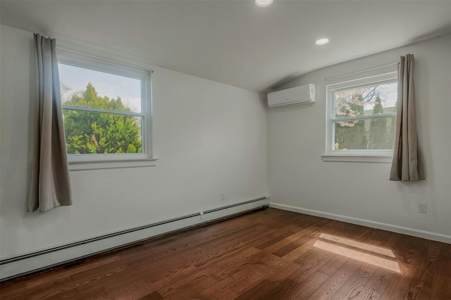 empty room with dark wood-type flooring, vaulted ceiling, a baseboard heating unit, an AC wall unit, and baseboards