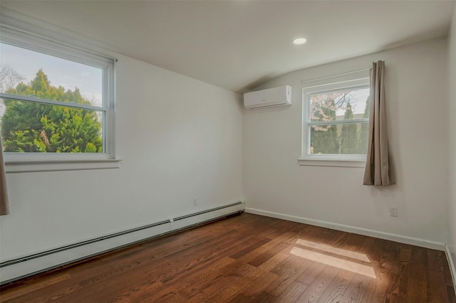 unfurnished room with baseboards, vaulted ceiling, a baseboard heating unit, dark wood-style floors, and a wall unit AC