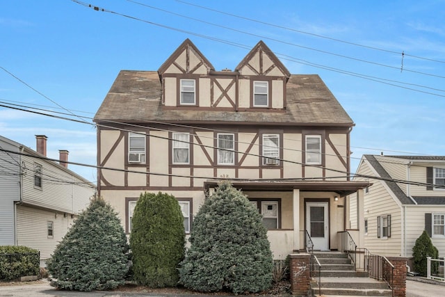 28 Greenwood Ave, Port Chester, NY 10573 - tudor-style house featuring stucco siding