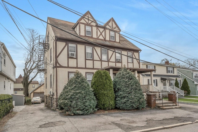 28 Greenwood Ave, Port Chester, NY 10573 - tudor-style house with stucco siding