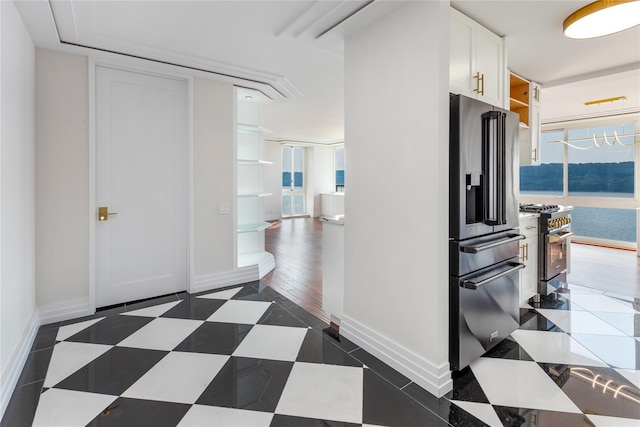 2521 Palisade Ave Unit 6A, Bronx, NY 10463 - kitchen featuring premium appliances, white cabinetry, and open shelves