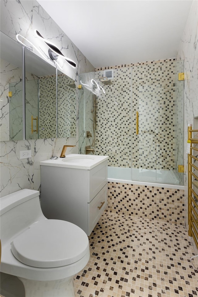 2521 Palisade Ave Unit 6A, Bronx, NY 10463 - bathroom with tile walls, vanity, tiled shower / bath combo, and tile patterned floors