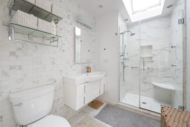 35 Turtle Cove Ln, Huntington, NY 11743 - full bath featuring a marble finish shower, vanity, a skylight, and marble finish flooring