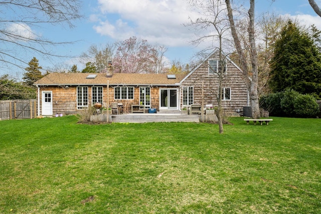 35 Turtle Cove Ln, Huntington, NY 11743 - rear view of property with a patio and a chimney