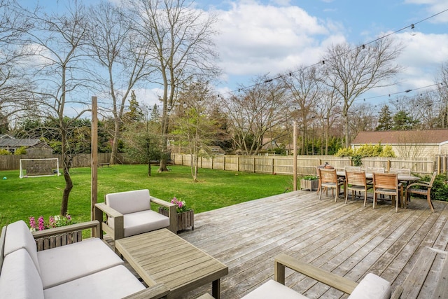 35 Turtle Cove Ln, Huntington, NY 11743 - wooden terrace featuring outdoor dining space, a fenced backyard, and an outdoor hangout area