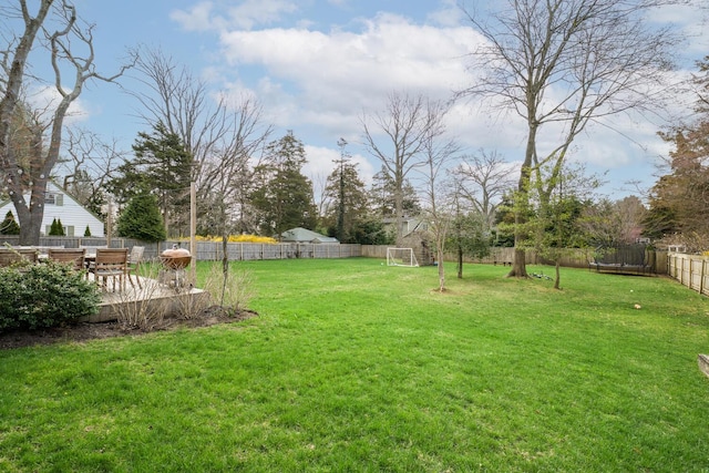 35 Turtle Cove Ln, Huntington, NY 11743 - fenced backyard featuring a deck