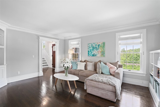 living room with crown molding, baseboards, stairway, dark wood-type flooring, and ornate columns