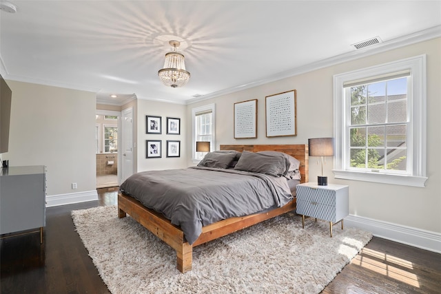 bedroom featuring baseboards, multiple windows, ornamental molding, dark wood finished floors, and a chandelier