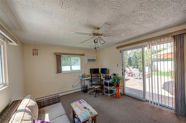 office space with carpet flooring, a textured ceiling, ceiling fan, a baseboard radiator, and a wall mounted AC