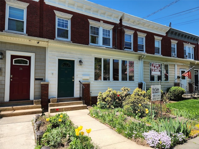 view of property featuring entry steps