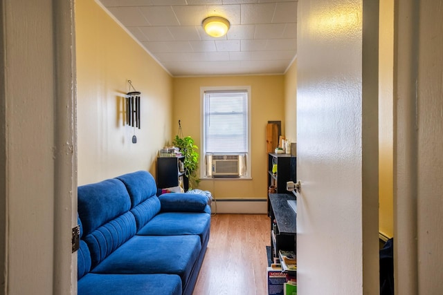 101-14 95th St, Ozone Park, NY 11416 - sitting room with baseboard heating, ornamental molding, wood finished floors, and cooling unit