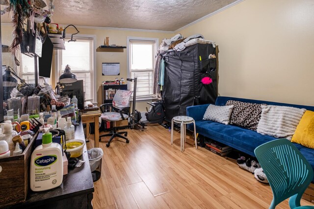 101-14 95th St, Ozone Park, NY 11416 - living area featuring crown molding, wood finished floors, and a textured ceiling
