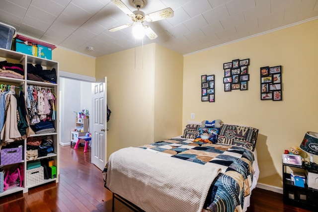 101-14 95th St, Ozone Park, NY 11416 - bedroom with crown molding, hardwood / wood-style floors, a closet, ceiling fan, and baseboards