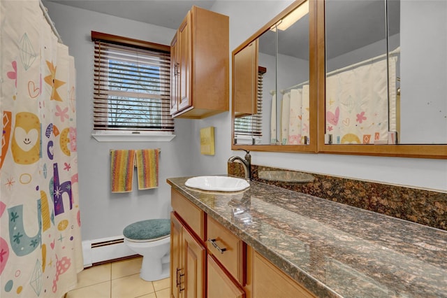 bathroom featuring a shower with shower curtain, vanity, a baseboard heating unit, tile patterned floors, and toilet