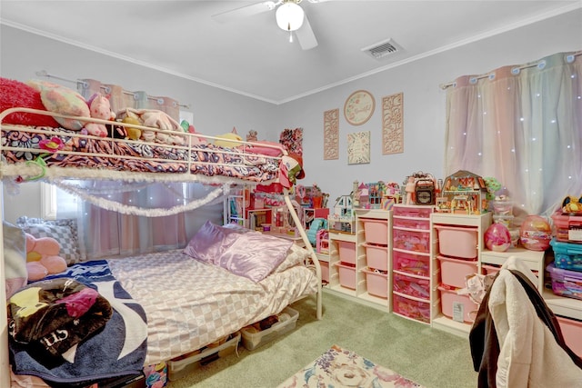 bedroom with crown molding, carpet flooring, ceiling fan, and visible vents