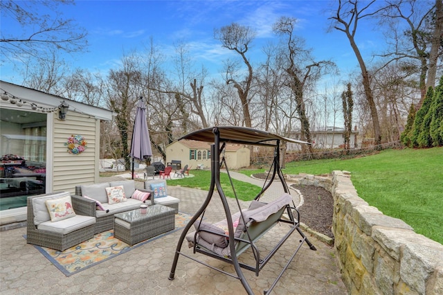 view of patio / terrace with an outbuilding and an outdoor hangout area