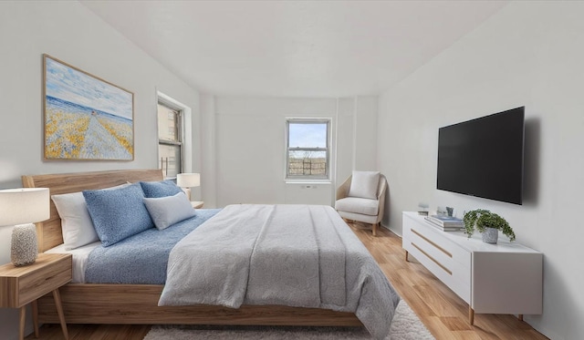 bedroom with light wood-type flooring