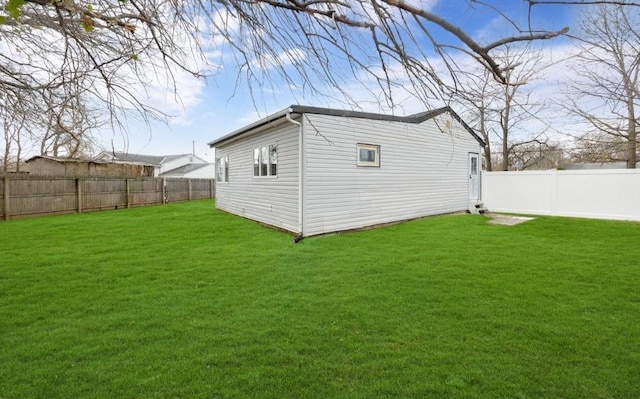 view of outbuilding with a fenced backyard