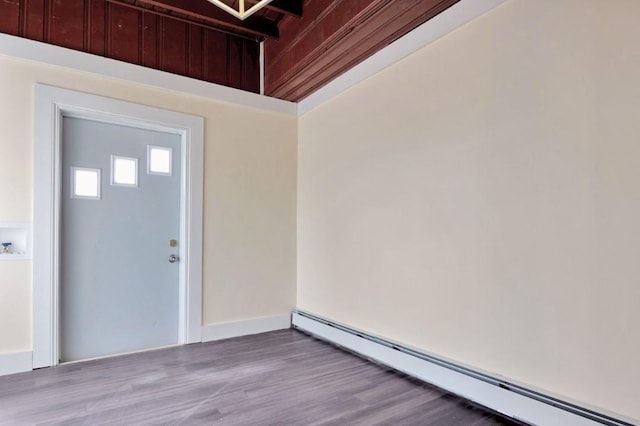 property entrance with a baseboard radiator