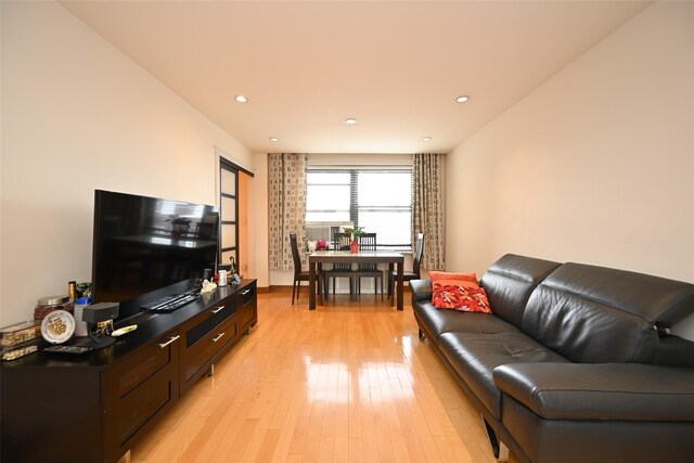 99-60 63rd Rd Unit 9Y, Rego Park, NY 11374 - living area with recessed lighting and light wood-type flooring