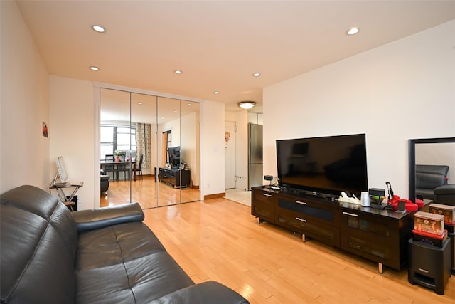 99-60 63rd Rd Unit 9Y, Rego Park, NY 11374 - living room with light wood-type flooring and recessed lighting