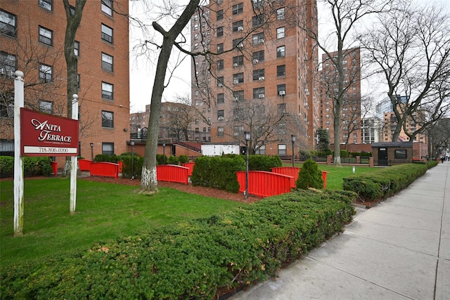 99-60 63rd Rd Unit 9Y, Rego Park, NY 11374 - view of community with a lawn