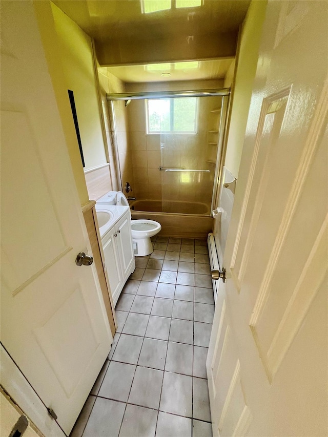 7 Murray Ln, Coram, NY 11727 - bathroom featuring vanity, tile patterned flooring, combined bath / shower with glass door, and baseboard heating