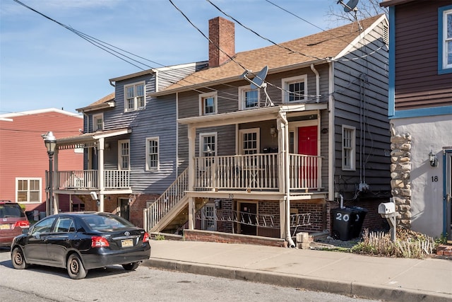 20 E Parmenter St, Newburgh, NY 12550 - multi unit property with a chimney and a porch