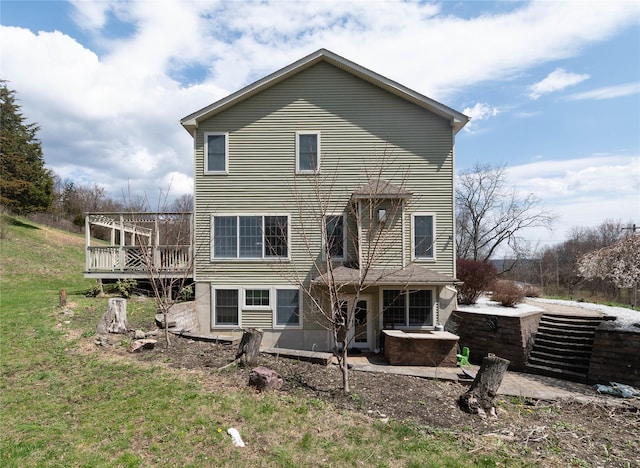 rear view of house with a deck