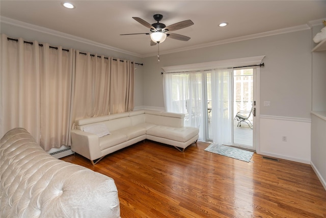 unfurnished living room with visible vents, a ceiling fan, recessed lighting, wood finished floors, and a baseboard heating unit