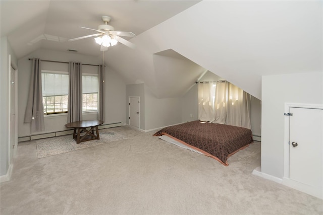 bedroom with carpet floors, a baseboard radiator, baseboards, and lofted ceiling