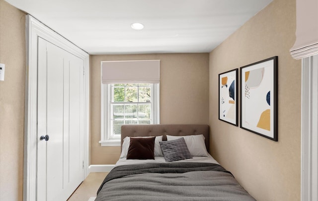 80 E Broadway, Roslyn, NY 11576 - bedroom featuring baseboards and recessed lighting