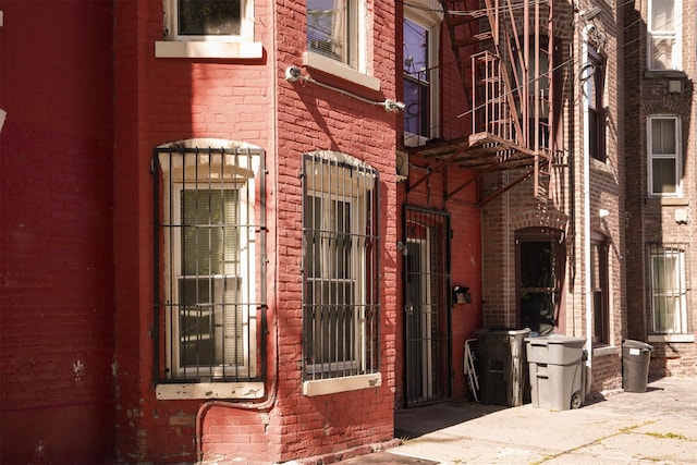 138 S Clark St, Newburgh, NY 12550 - property entrance featuring brick siding
