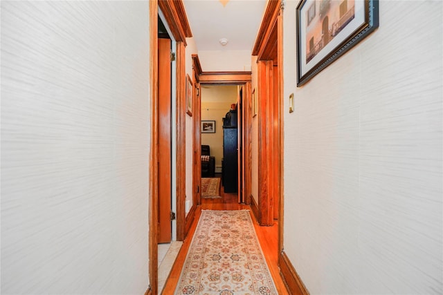 hallway featuring light wood-style flooring