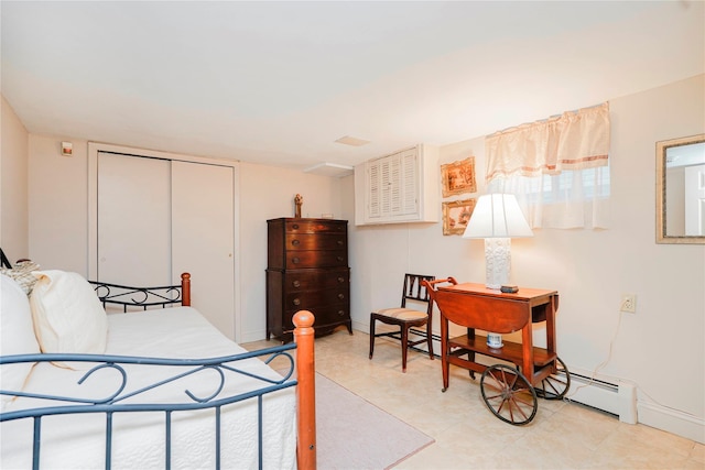 bedroom featuring a closet and baseboards