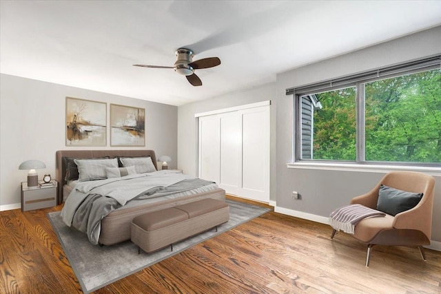 19 James Ct Unit 19, Port Chester, NY 10573 - bedroom with baseboards, a closet, wood finished floors, and ceiling fan