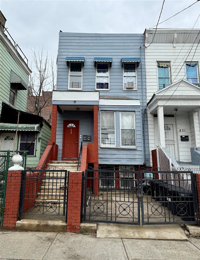 multi unit property with a fenced front yard
