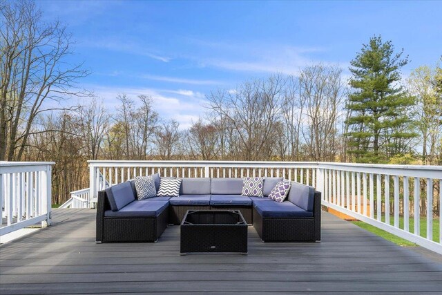 deck with an outdoor living space