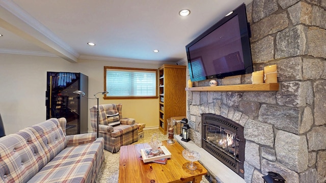 living area featuring recessed lighting, a fireplace, and crown molding